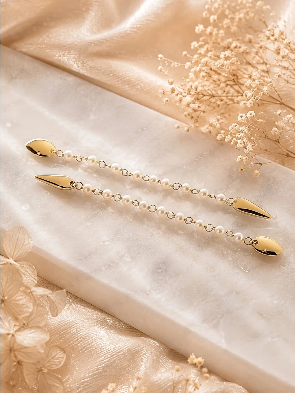 Tory Burch Snake Linear earring.